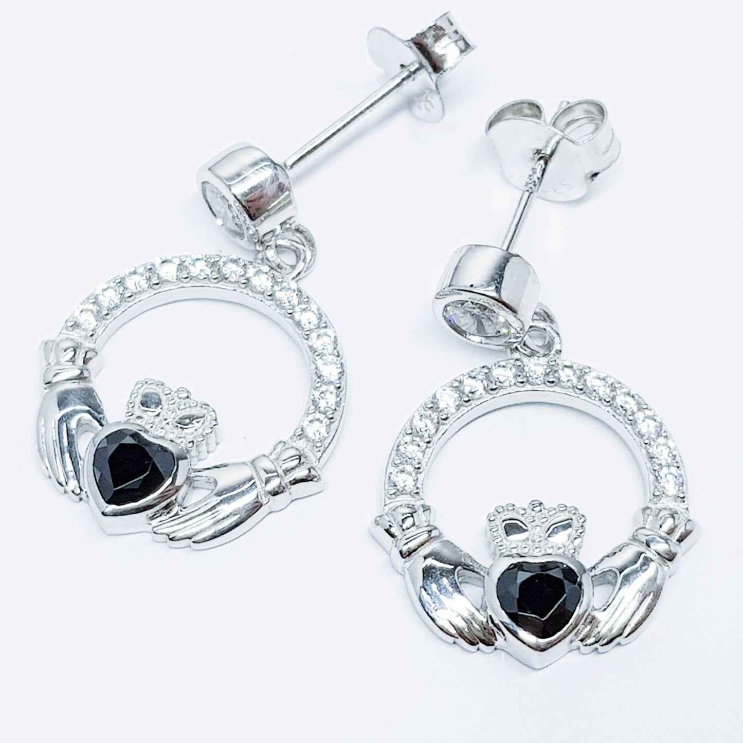 Silver claddagh drop earrings with black stone heart