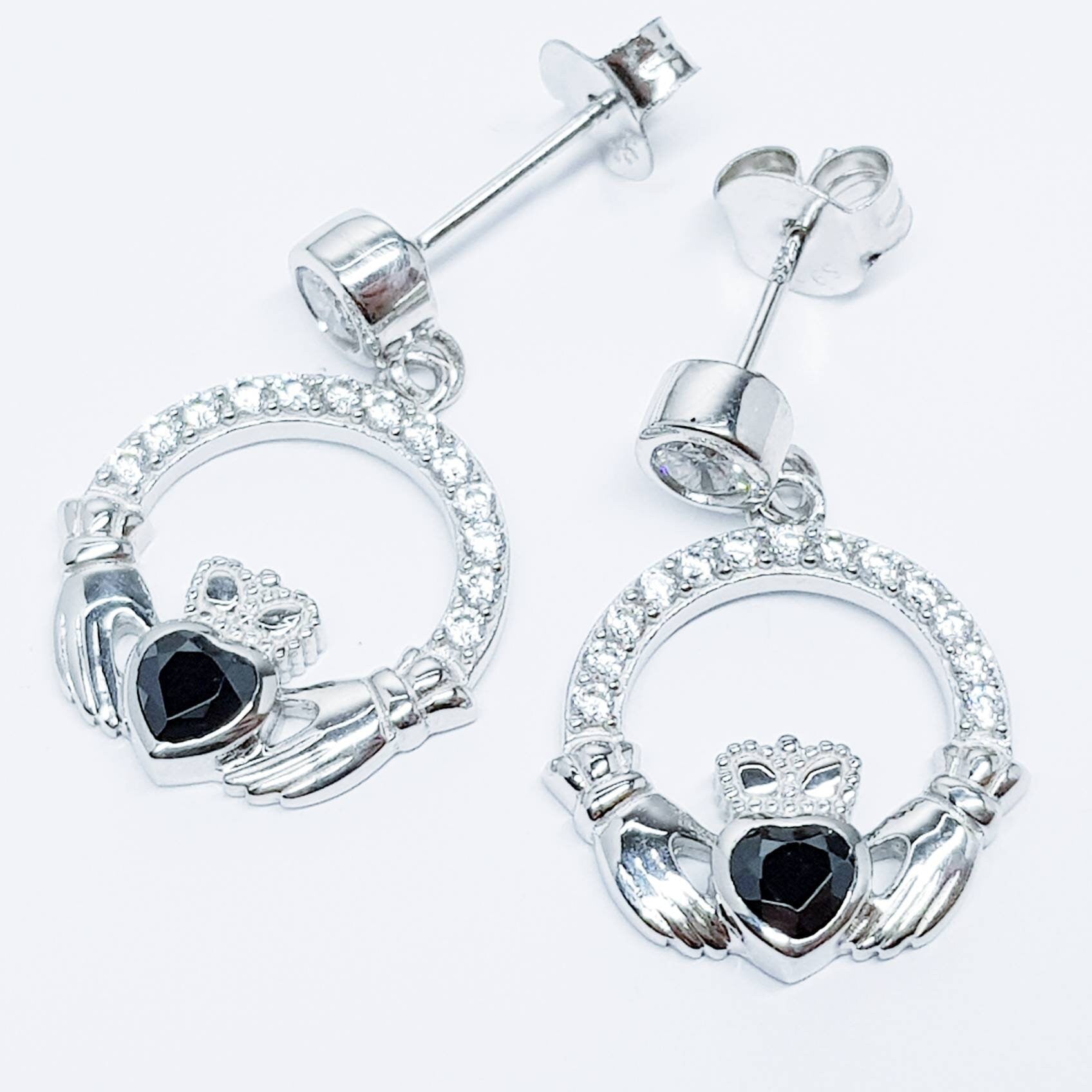 Silver claddagh drop earrings with black stone heart