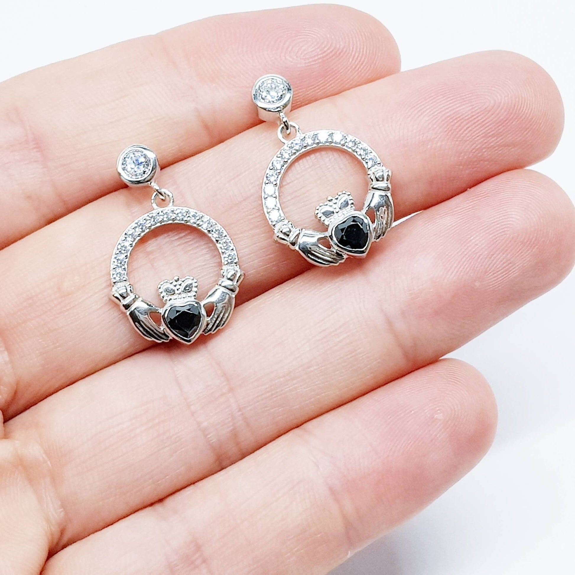 Silver claddagh drop earrings with black stone heart