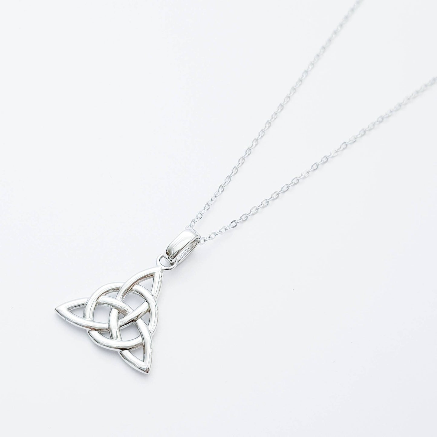 Double sided celtic knot pendant, silver triquetra celtic necklace made in Ireland with angel wing chain