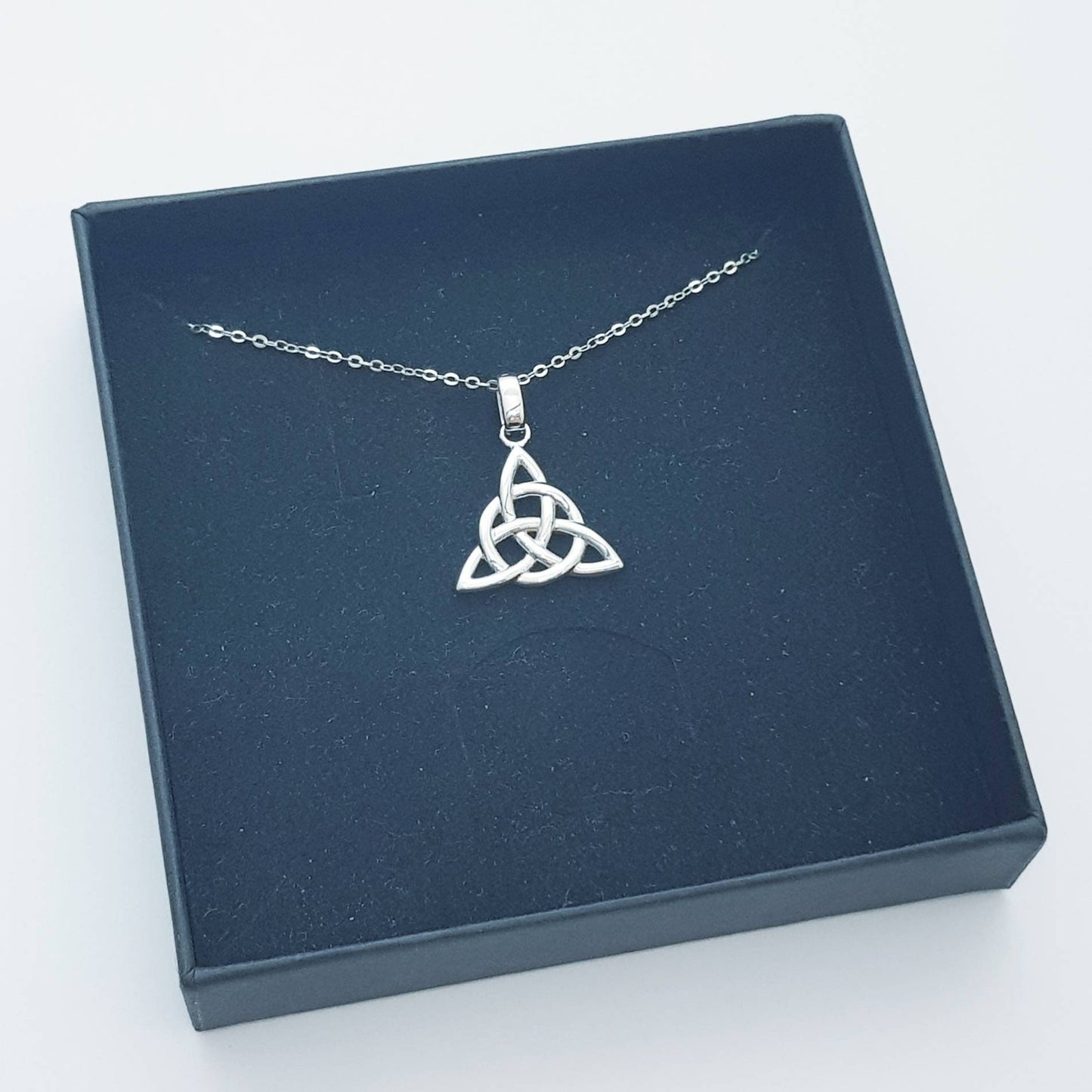 Double sided celtic knot pendant, silver triquetra celtic necklace made in Ireland with angel wing chain