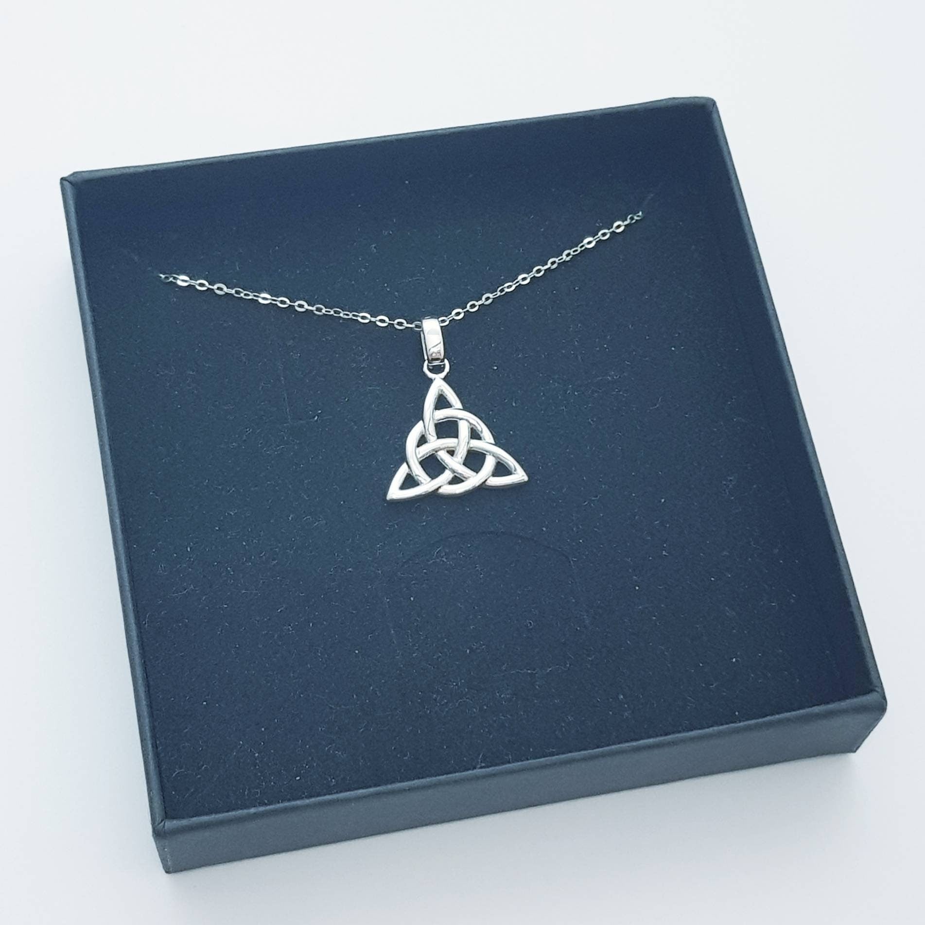 Double sided celtic knot pendant, silver triquetra celtic necklace made in Ireland with angel wing chain