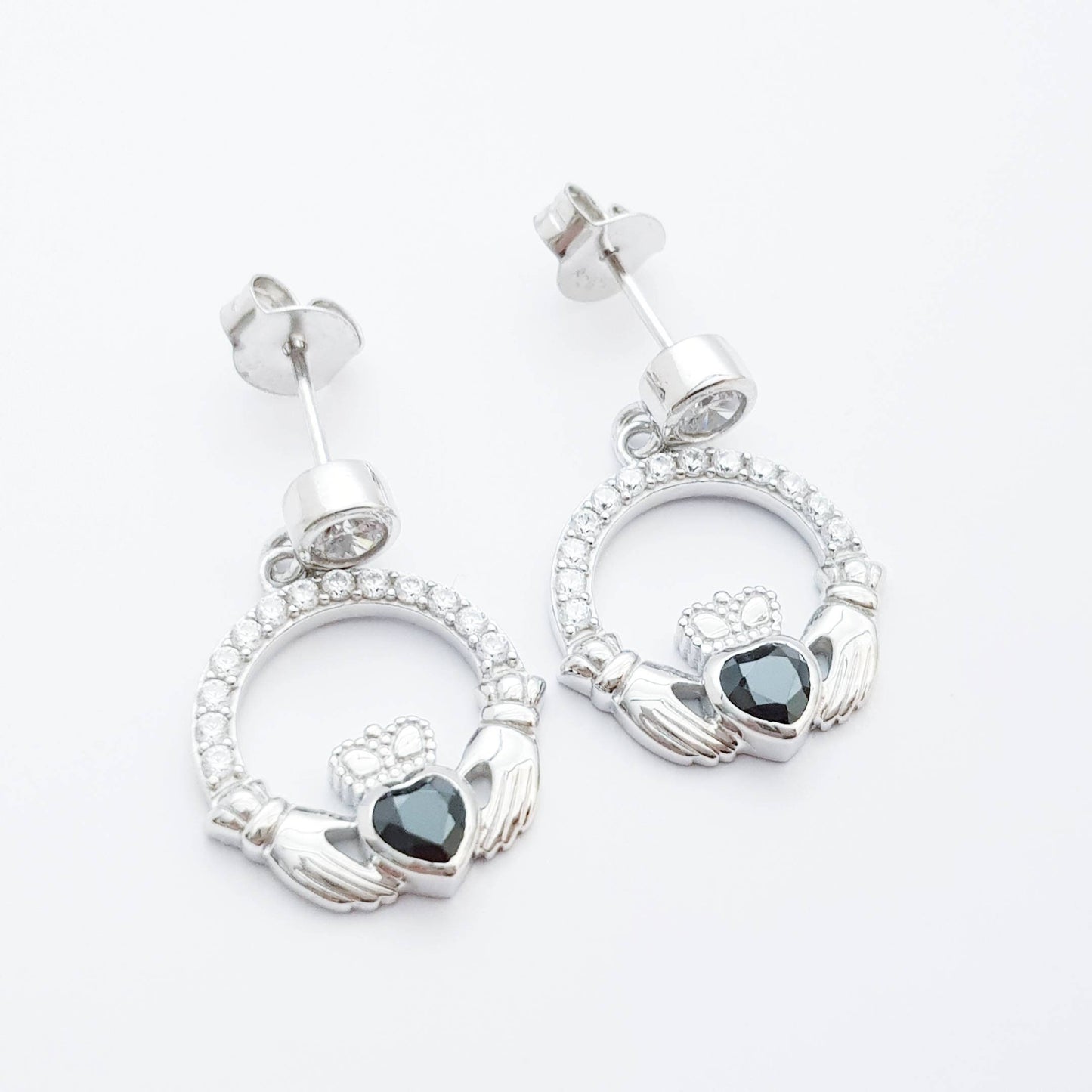 Silver claddagh drop earrings with black stone heart