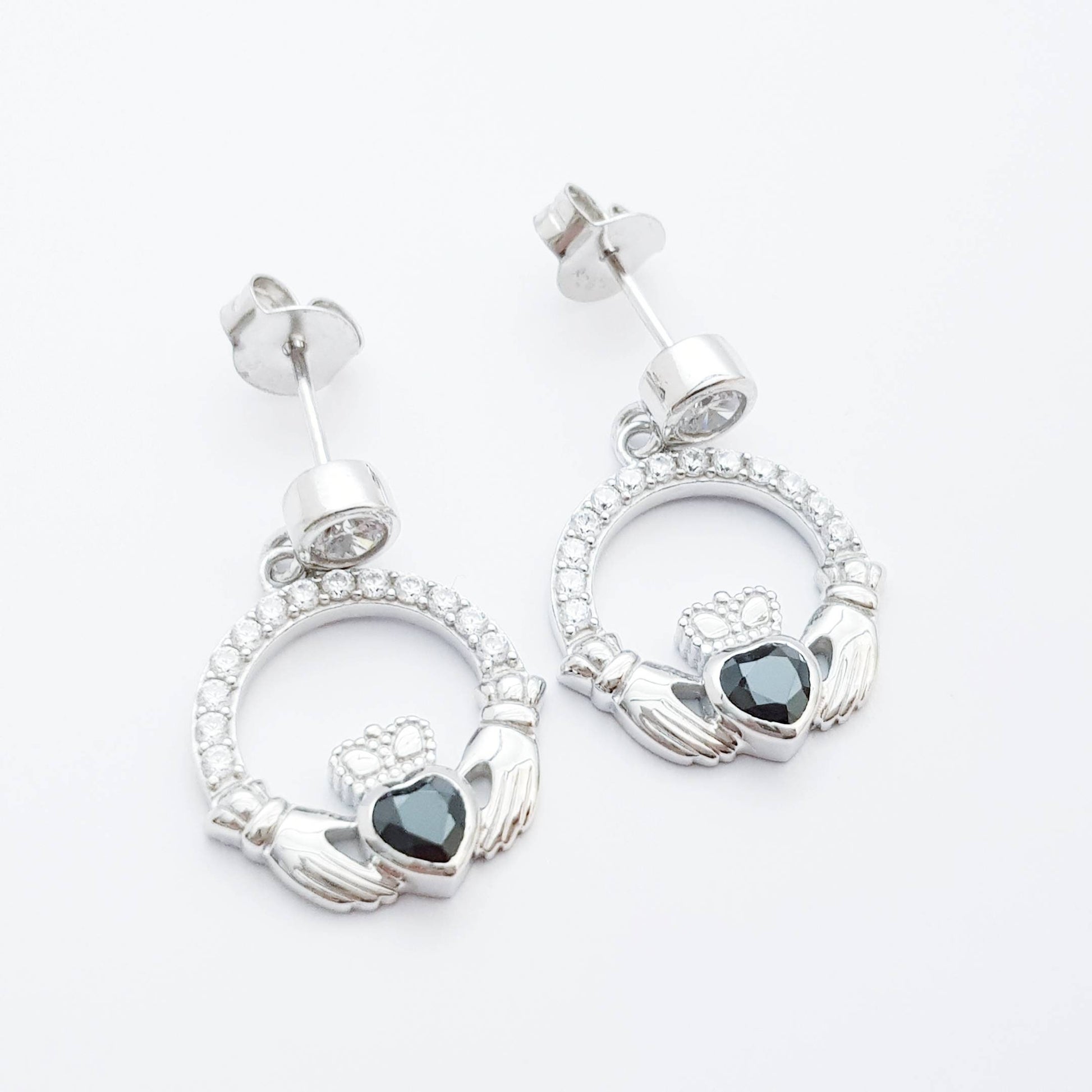 Silver claddagh drop earrings with black stone heart