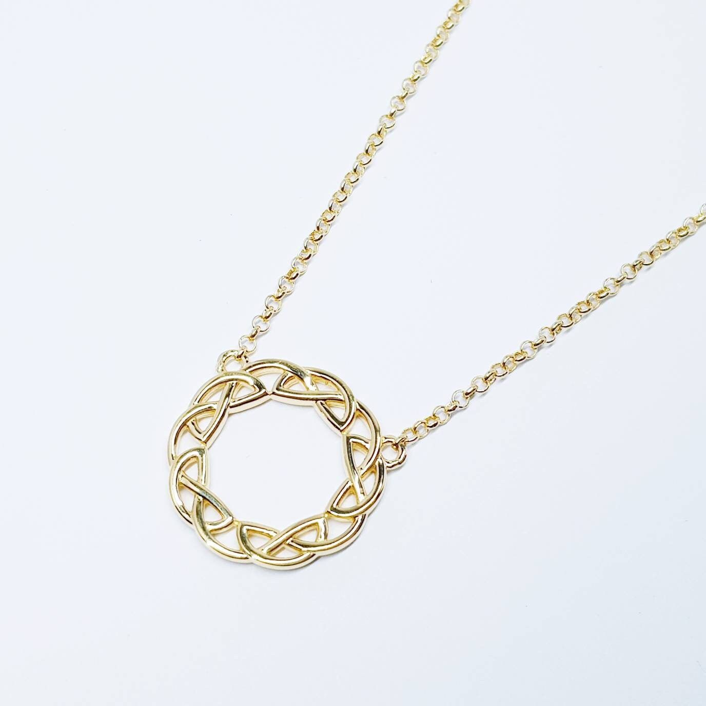 Sterling silver celtic knot pendant, gold round celtic necklace made in Ireland with angel wing chain