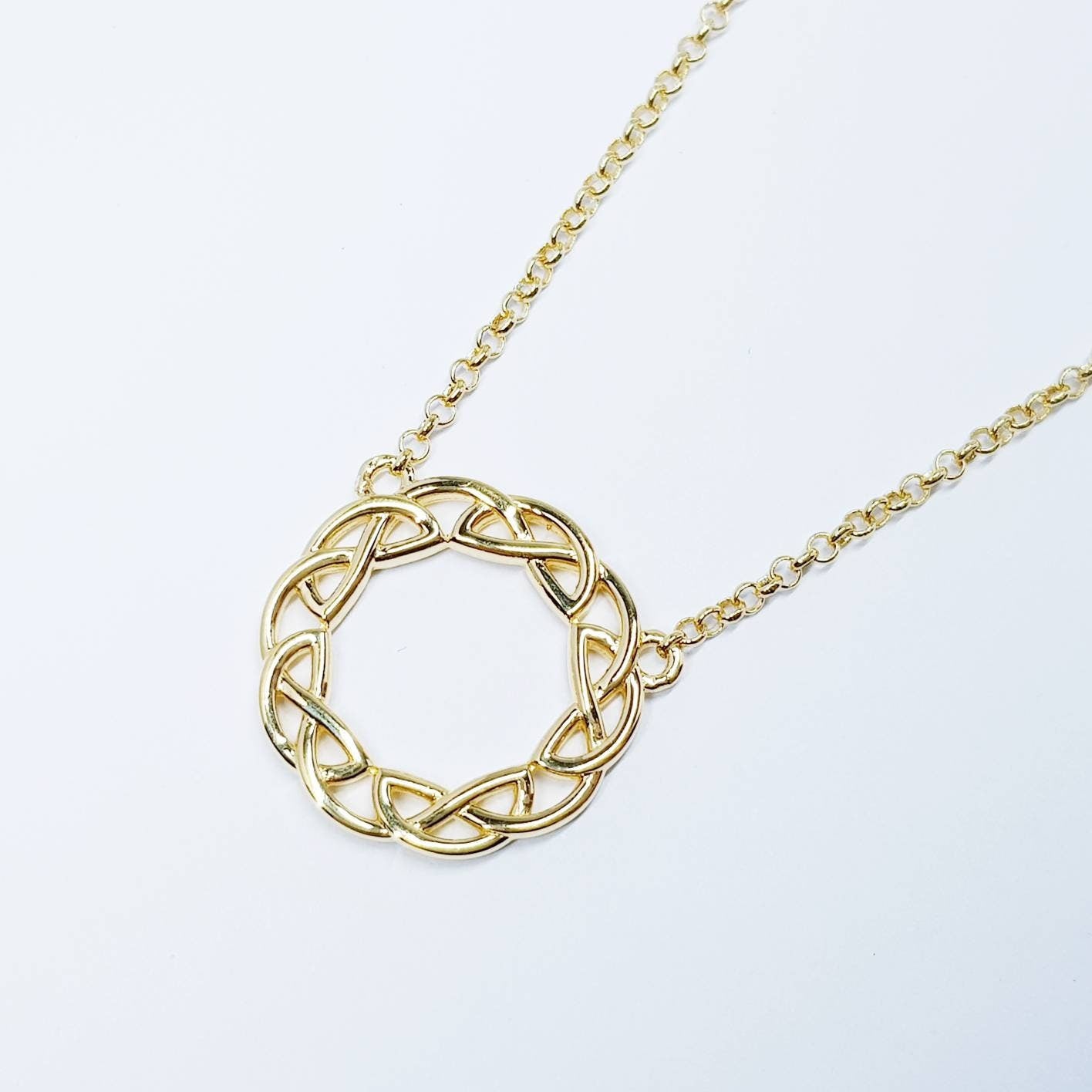 Sterling silver celtic knot pendant, gold round celtic necklace made in Ireland with angel wing chain