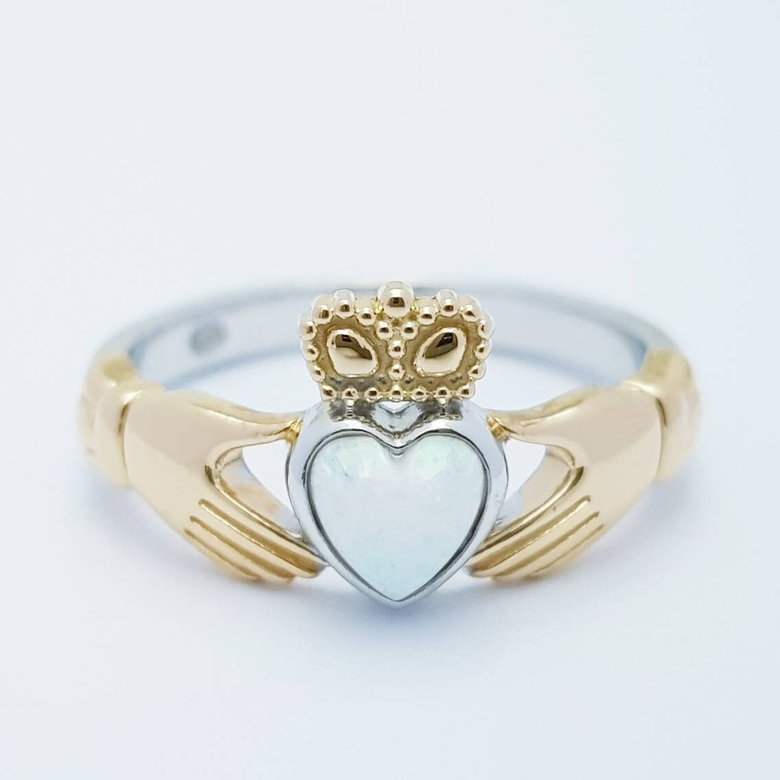 Sterling Silver yellow gold plated Claddagh ring set with opal stone, October birthstone