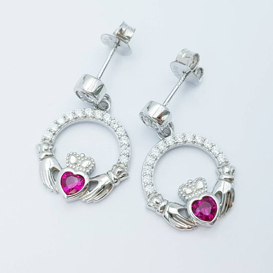 Silver claddagh drop earrings with red stone heart, July birthstone