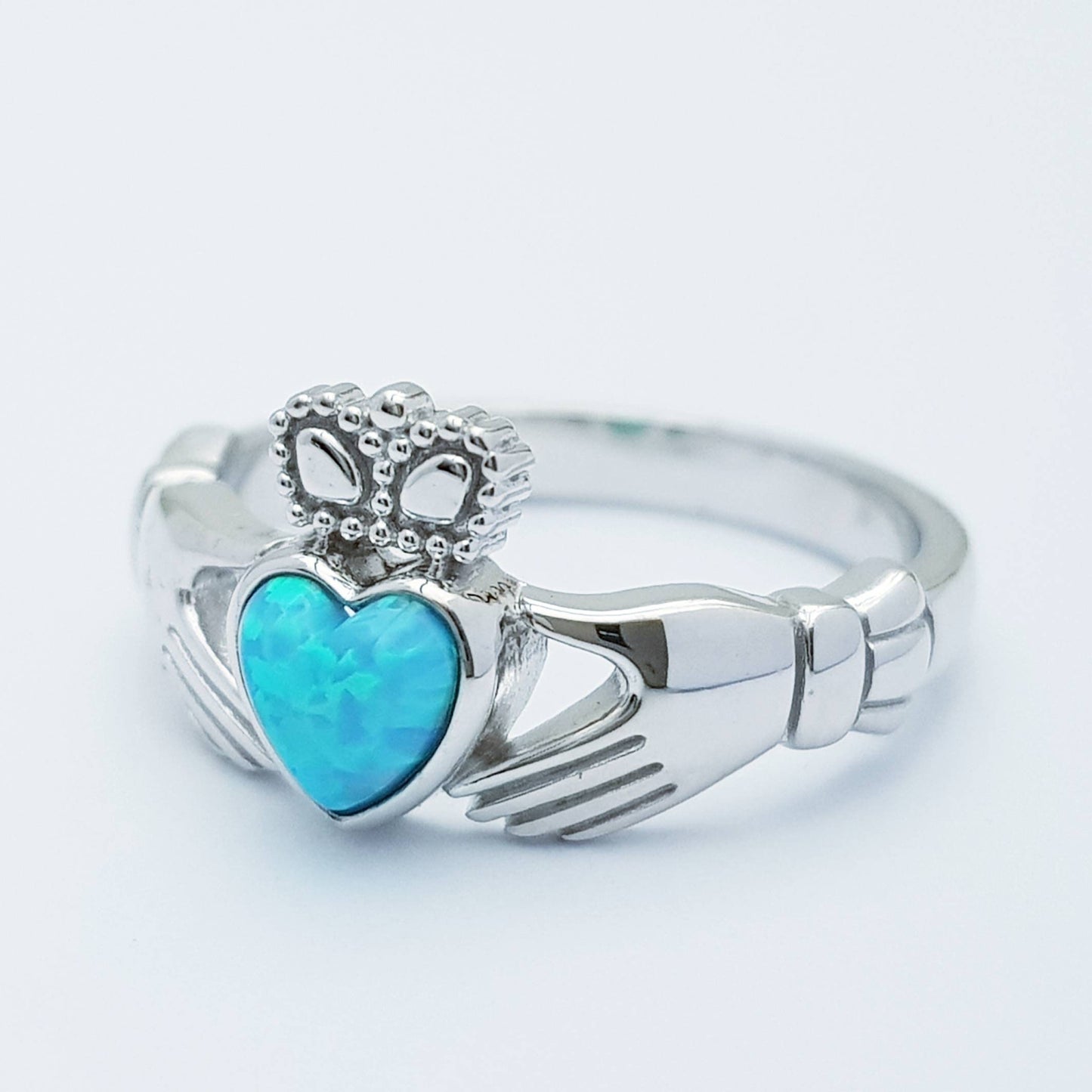 Sterling Silver Claddagh ring set with opal stone, October birthstone