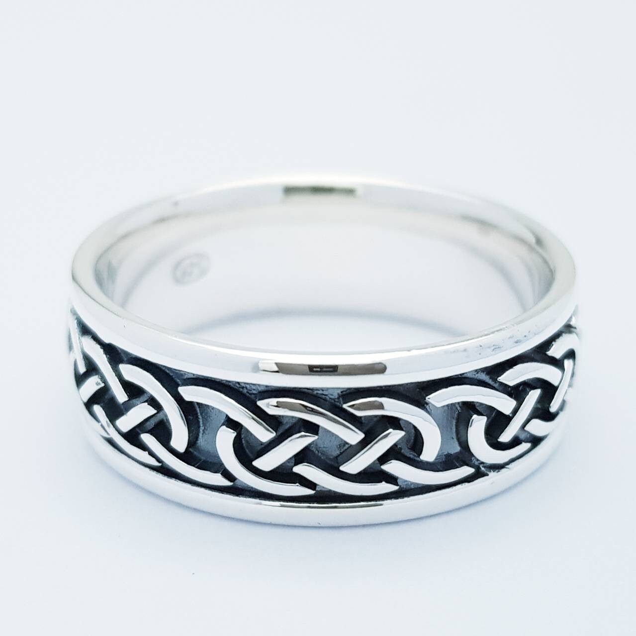 Sterling Silver Celtic Ring with oxidised black background