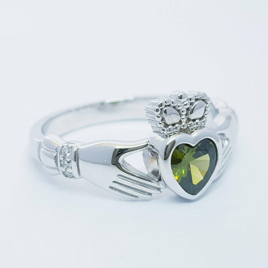 Irish Claddagh ring set with green peridot heart shaped stone from Galway, Ireland