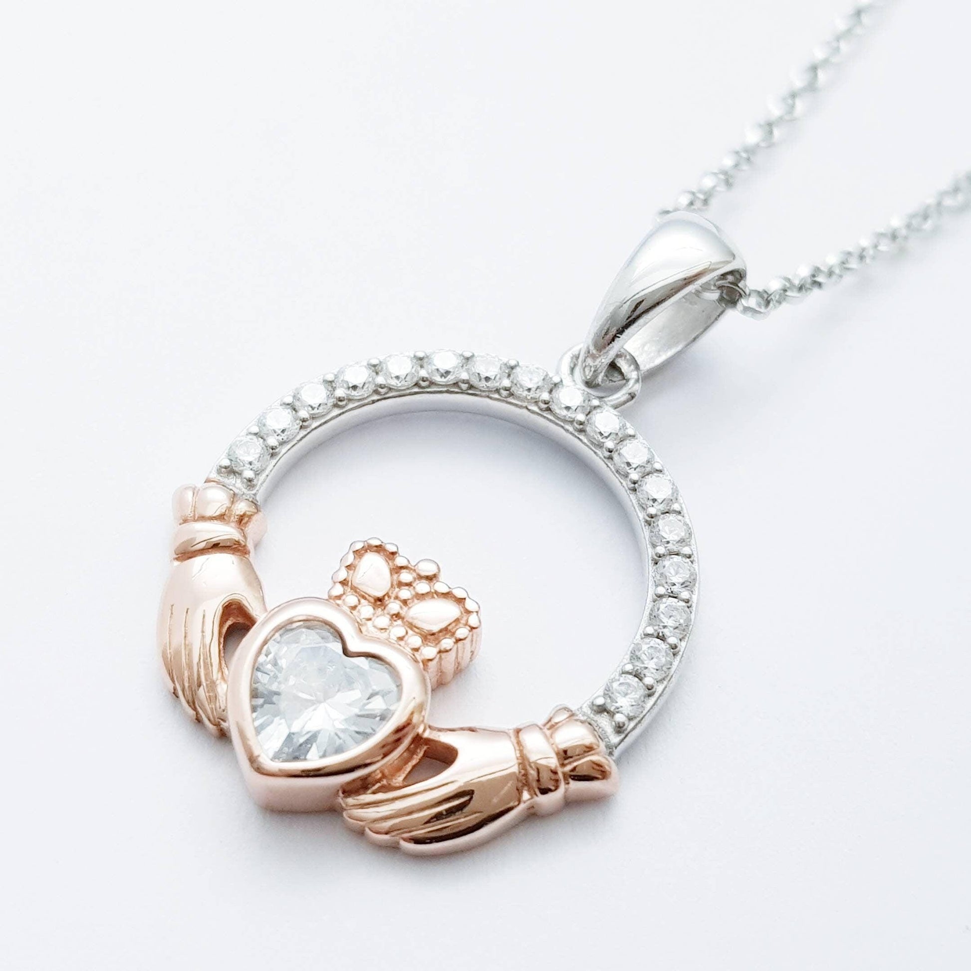Sterling silver april birthstone claddagh necklace with rose gold