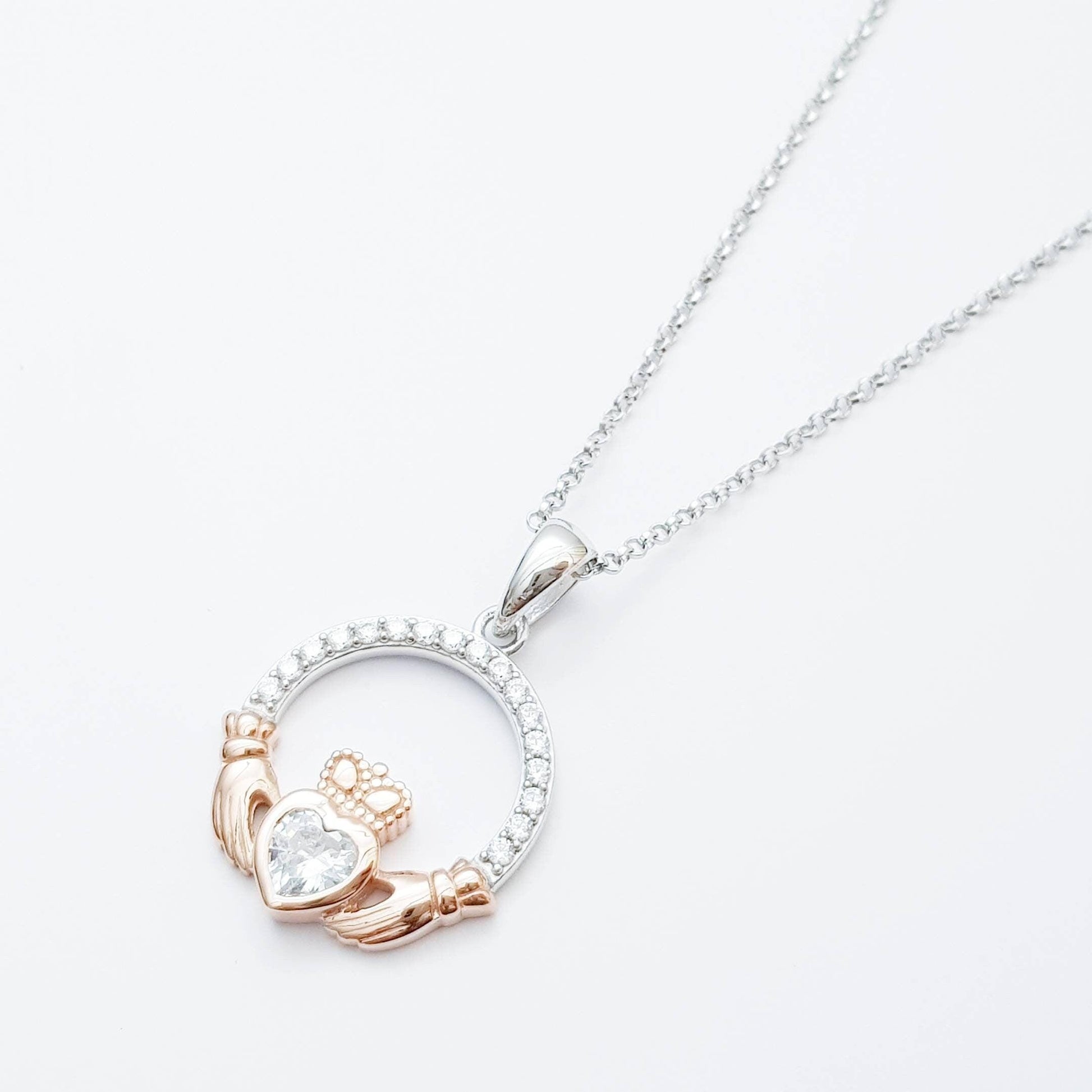 Sterling silver april birthstone claddagh necklace with rose gold
