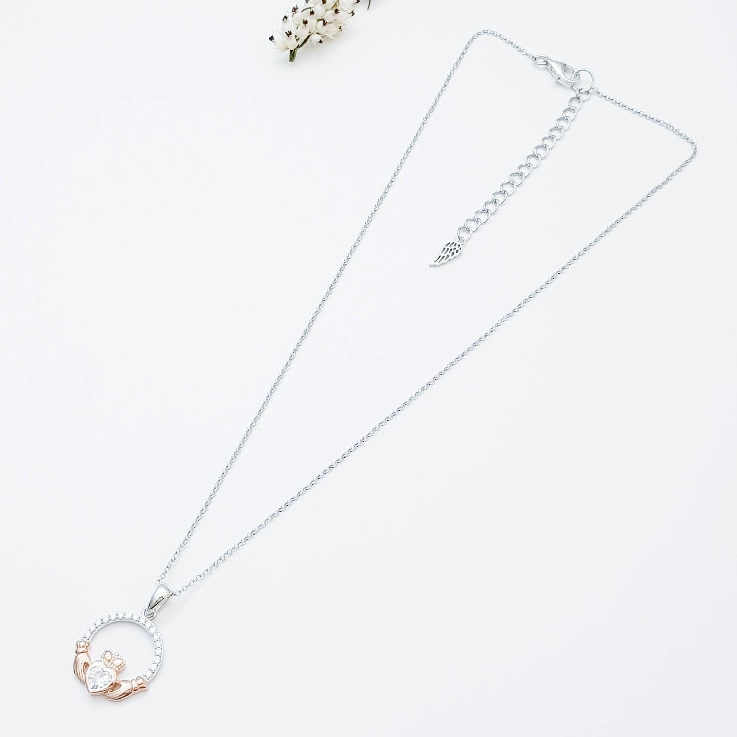 Sterling silver april birthstone claddagh necklace with rose gold