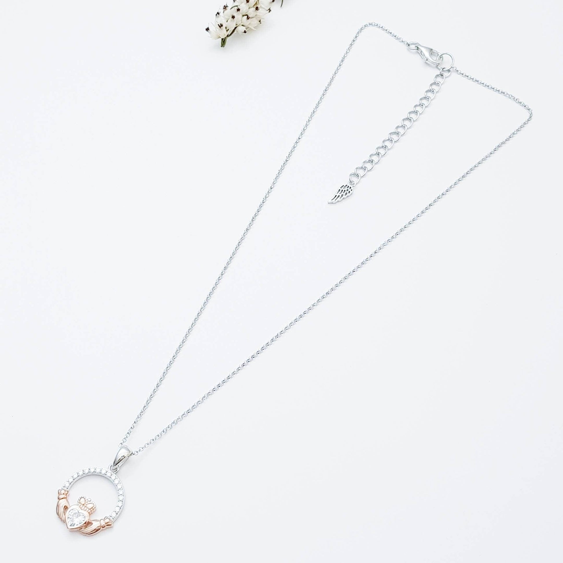 Sterling silver april birthstone claddagh necklace with rose gold