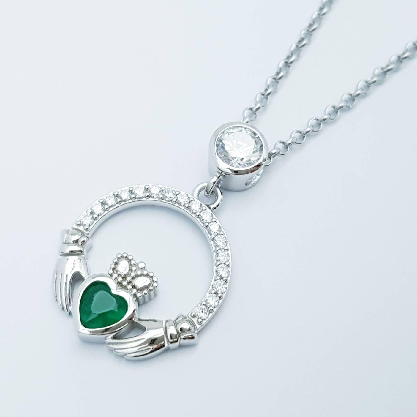 Sterling silver claddagh necklace with emerald green heart shaped stone