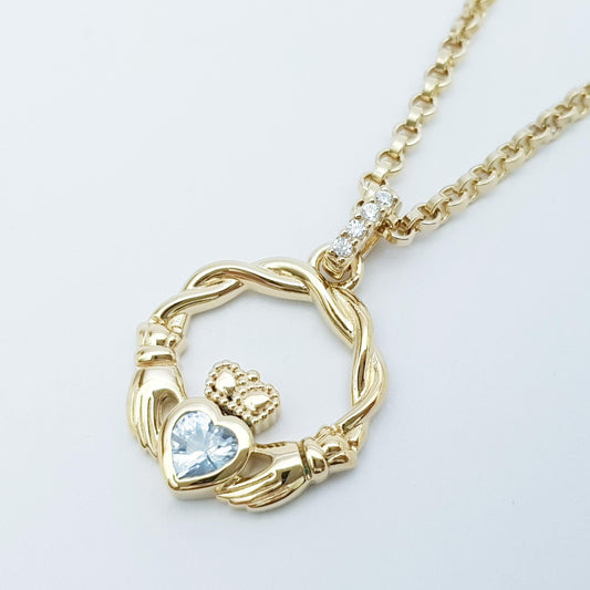 Gold plated sterling silver claddagh necklace set with Aquamarine march birthstone