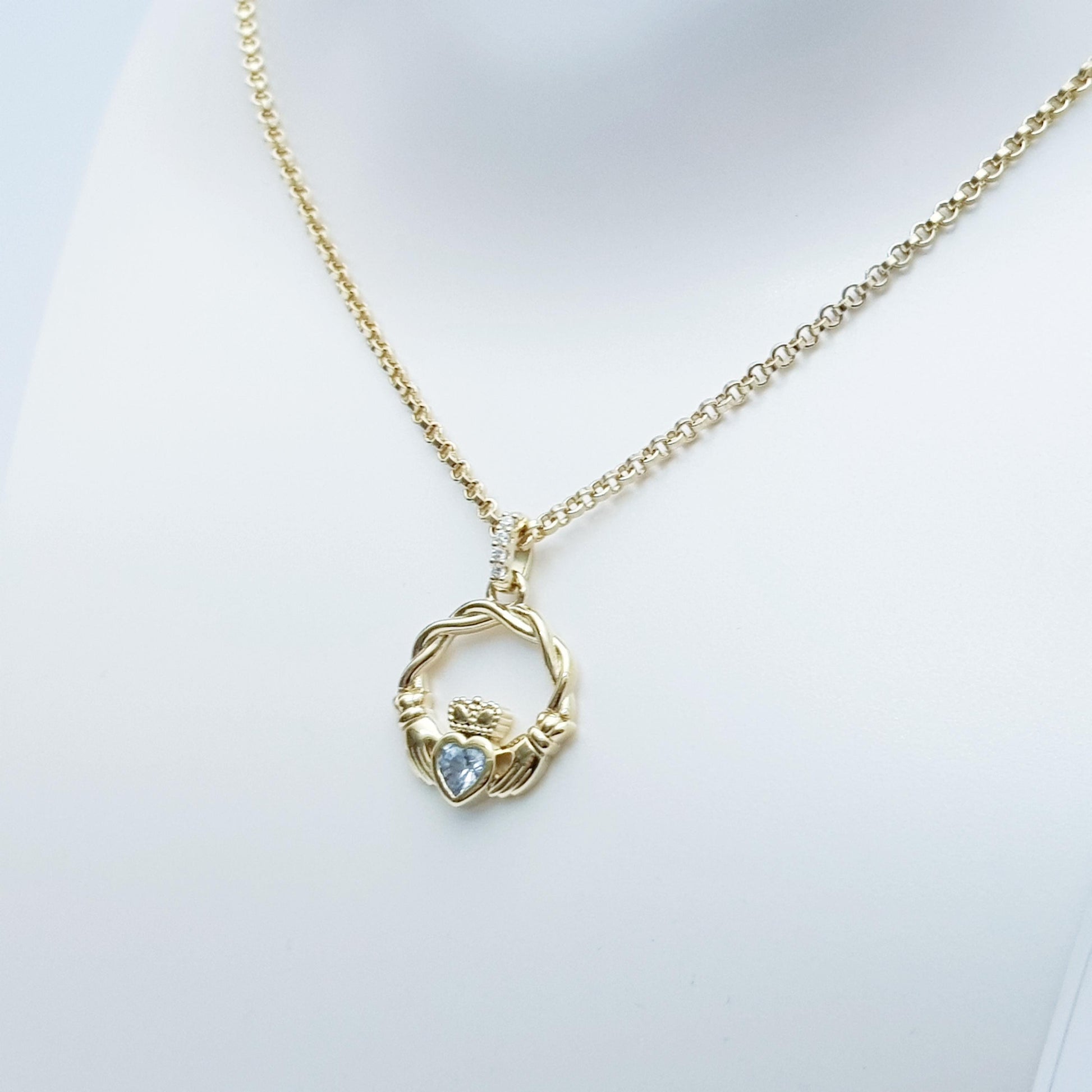 Gold plated sterling silver claddagh necklace set with Aquamarine march birthstone