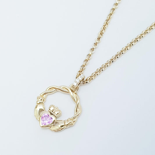 Dainty Sterling Silver claddagh necklace set with sparkling Pink heart