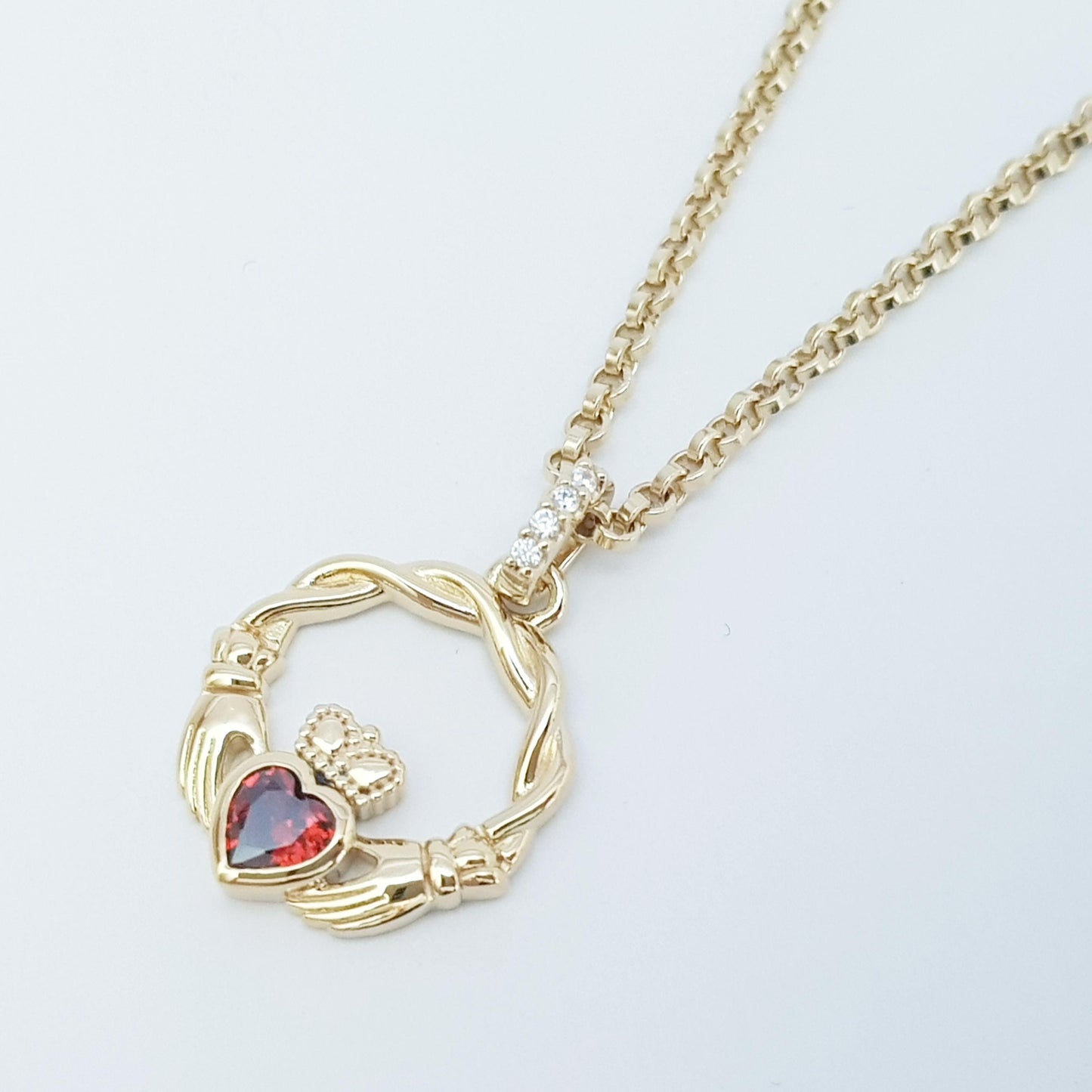 Dainty Sterling Silver claddagh necklace set with Garnet CZ heart