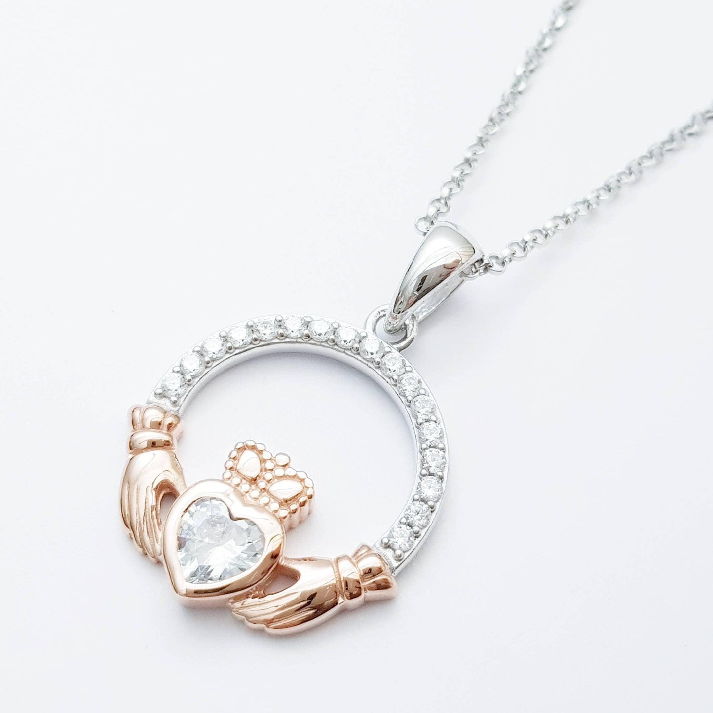 Sterling silver april birthstone claddagh necklace with rose gold