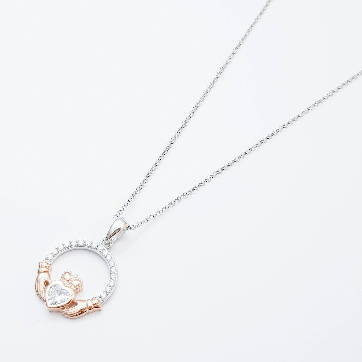 Sterling silver april birthstone claddagh necklace with rose gold