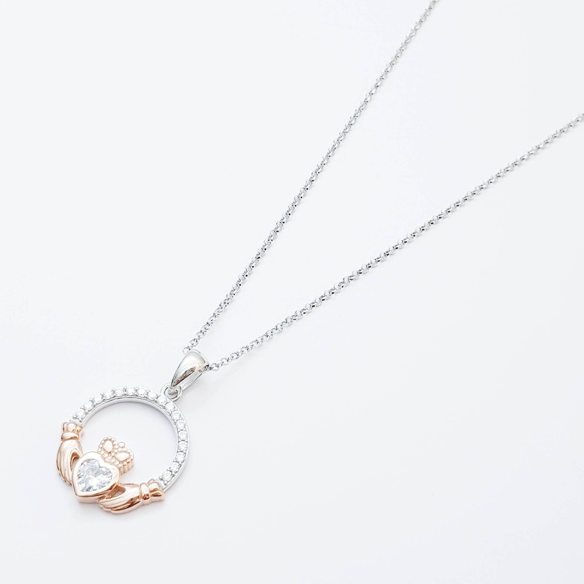 Sterling silver april birthstone claddagh necklace with rose gold