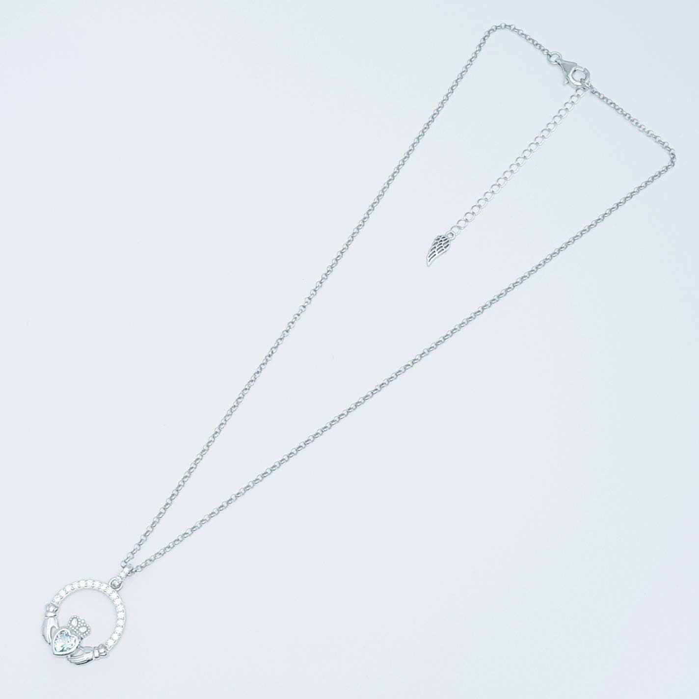 Sterling silver claddagh necklace with light blue aquamarine heart shaped stone, march birthstone
