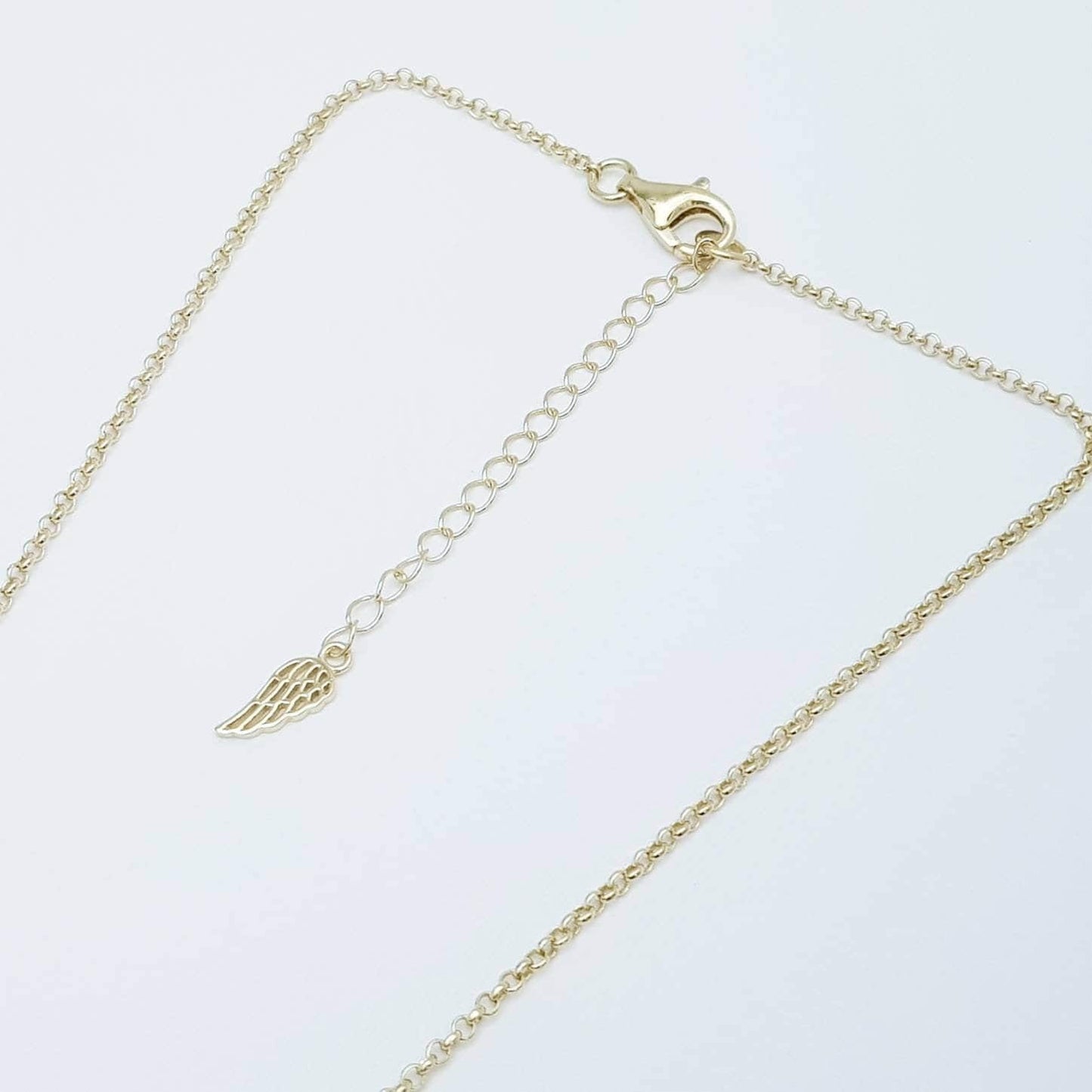 Small Sterling Silver claddagh necklace with gold plating and celtic braid.