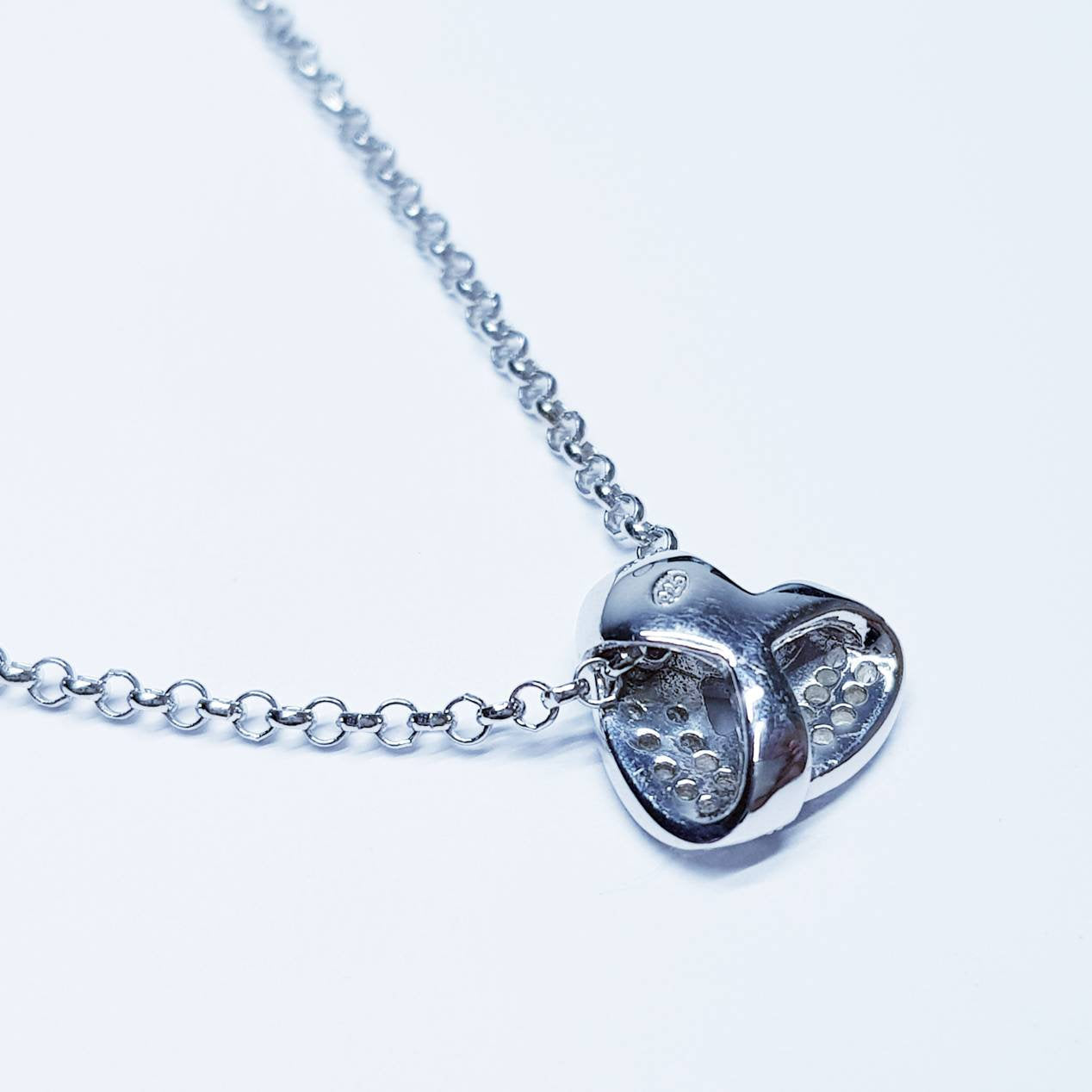 Small dainty necklace floating on sterling silver chain