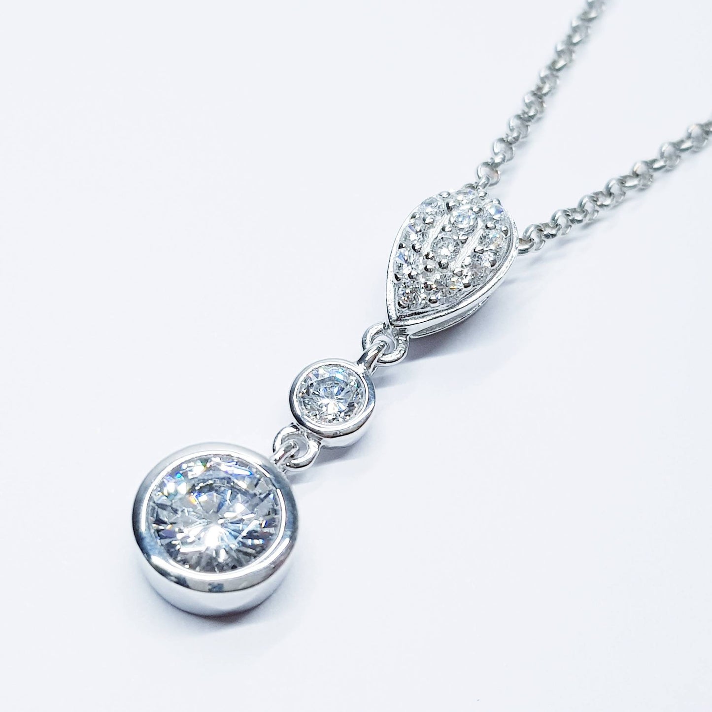 Elegant cubic zirconia pendant  floating on sterling silver chain