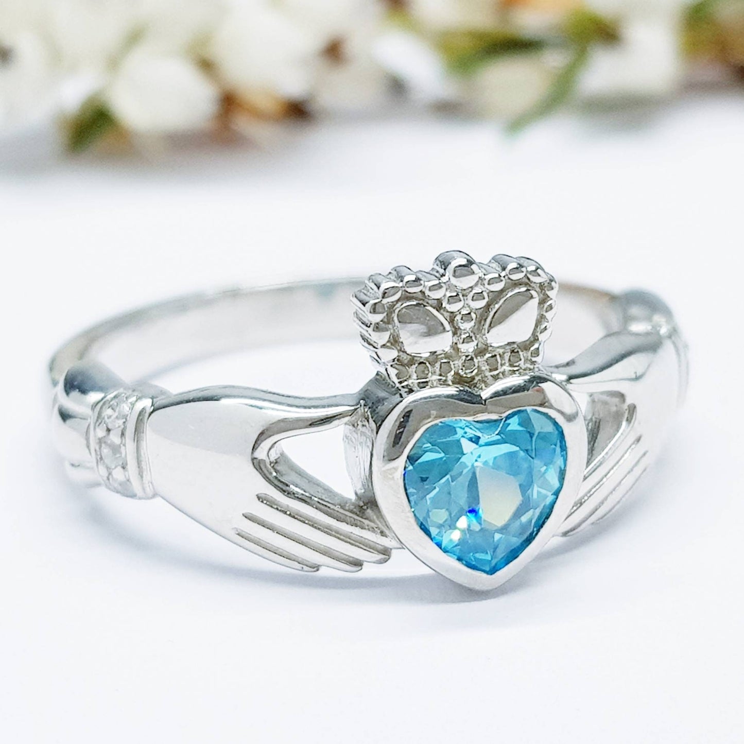 Sterling Silver Claddagh ring set with turquoise heart shaped stone