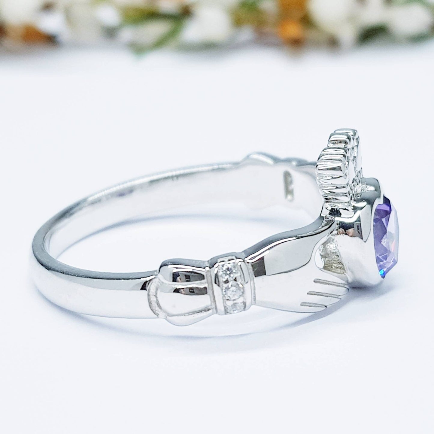 Sterling Silver Claddagh ring set with purple heart shaped stone, february birthstone claddagh