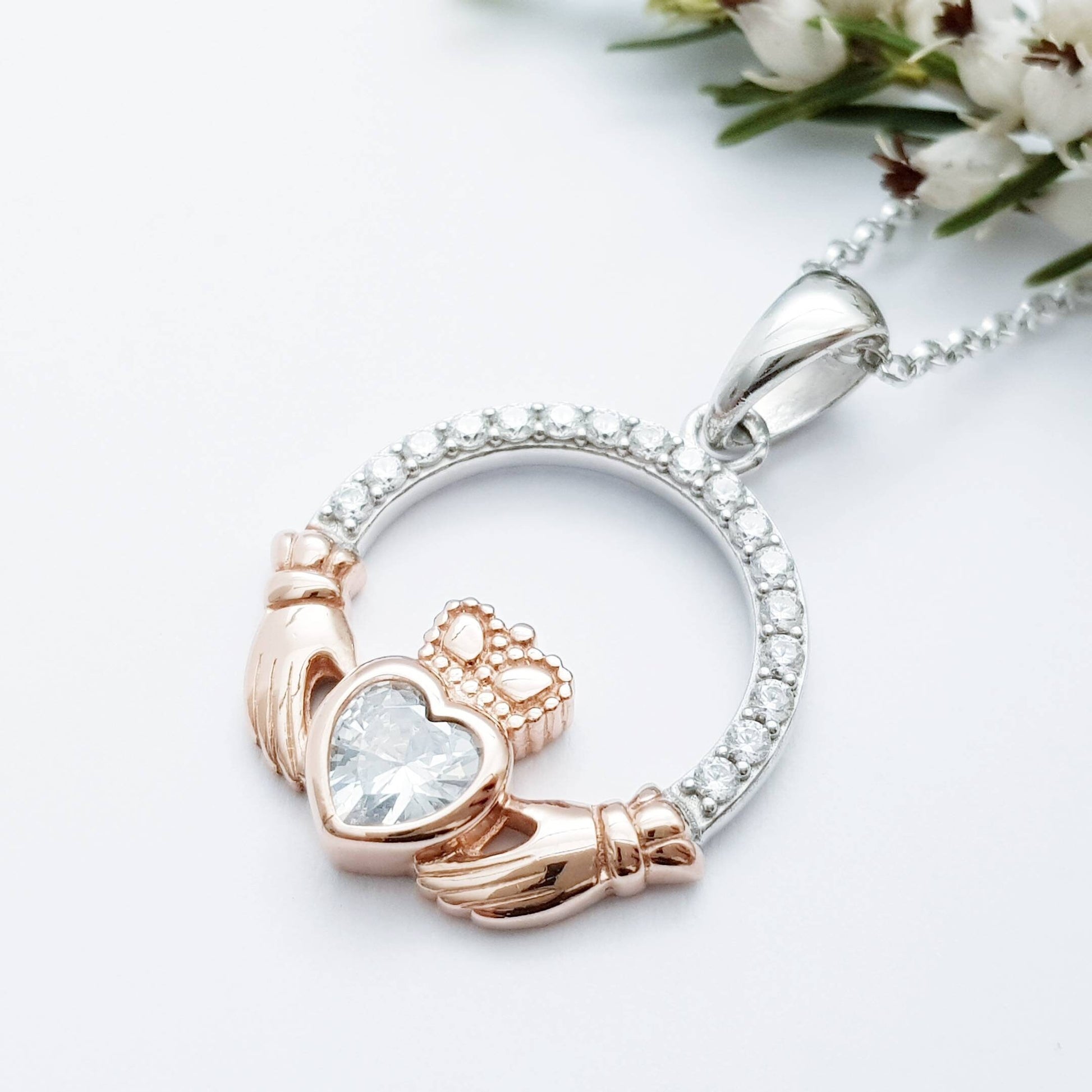 Sterling silver april birthstone claddagh necklace with rose gold