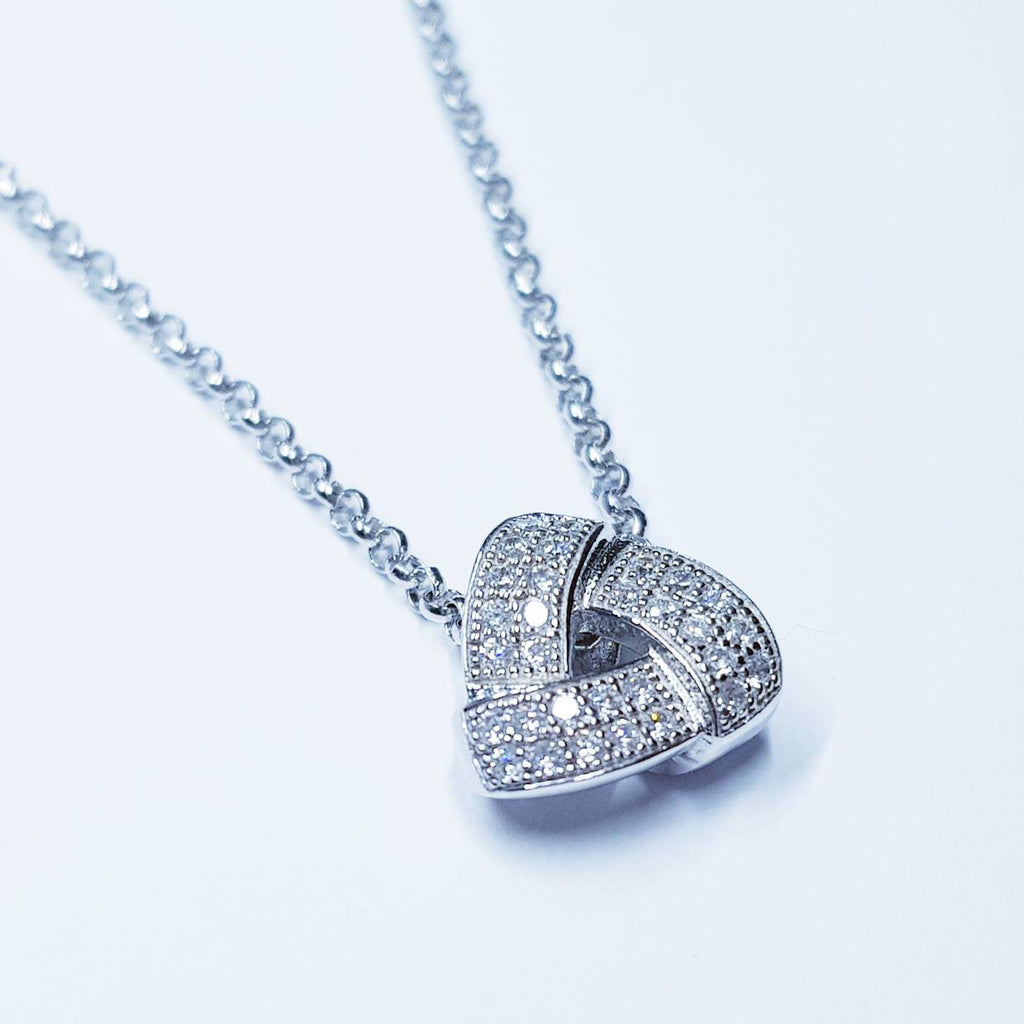 Small dainty necklace floating on sterling silver chain