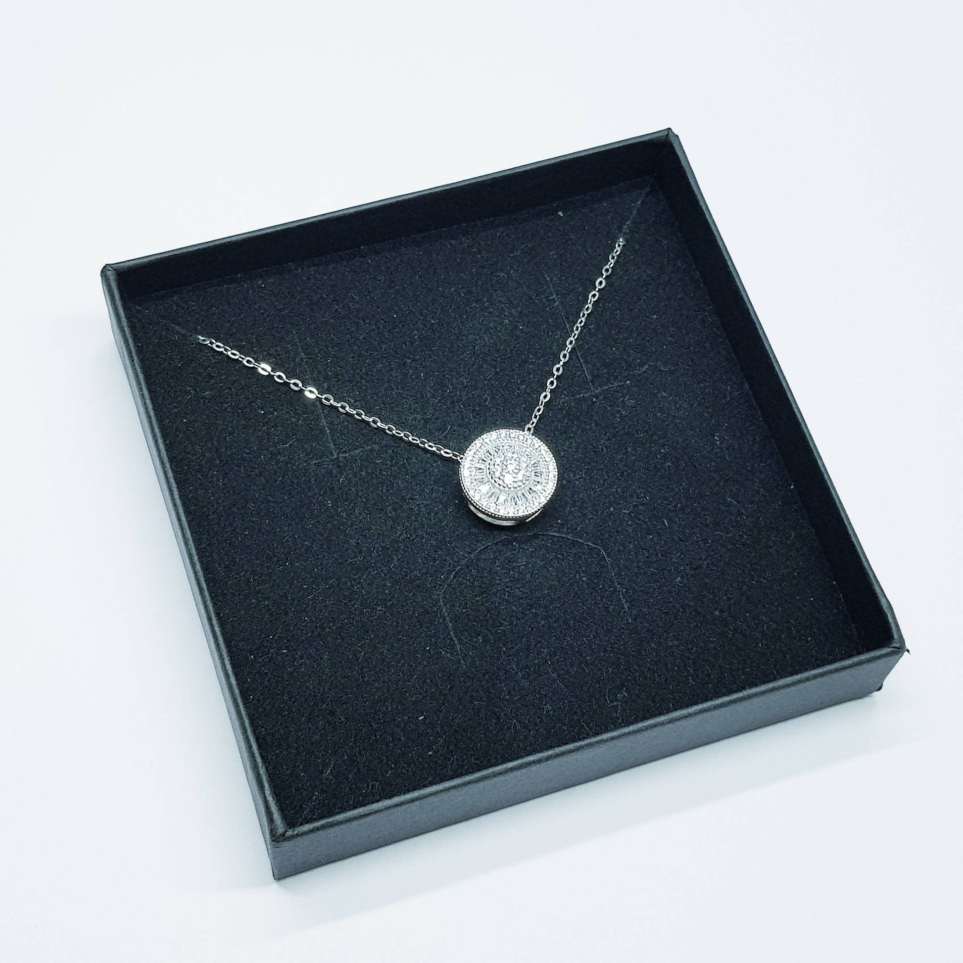 Vintage style round necklace floating on sterling silver chain