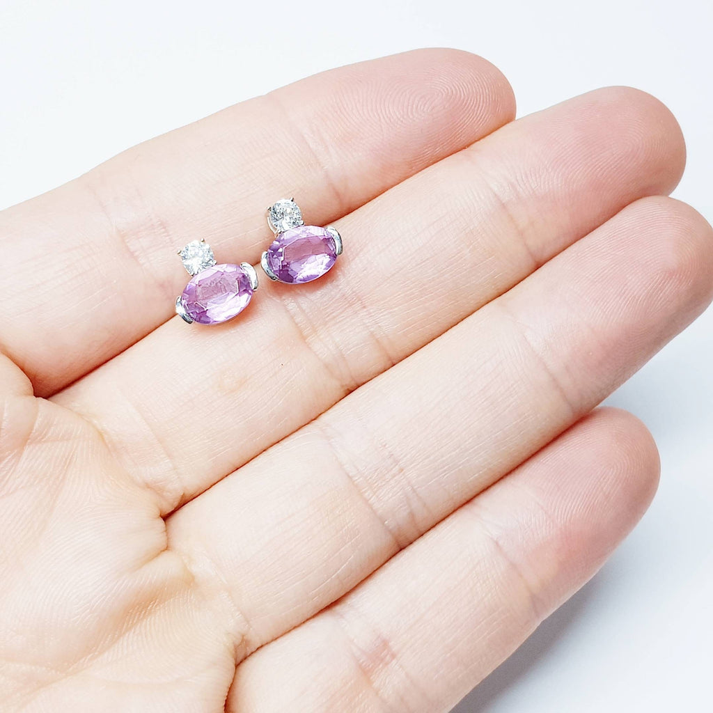 Small sterling silver studs set with purple and white cubic zirconia, sideways oval amethyst