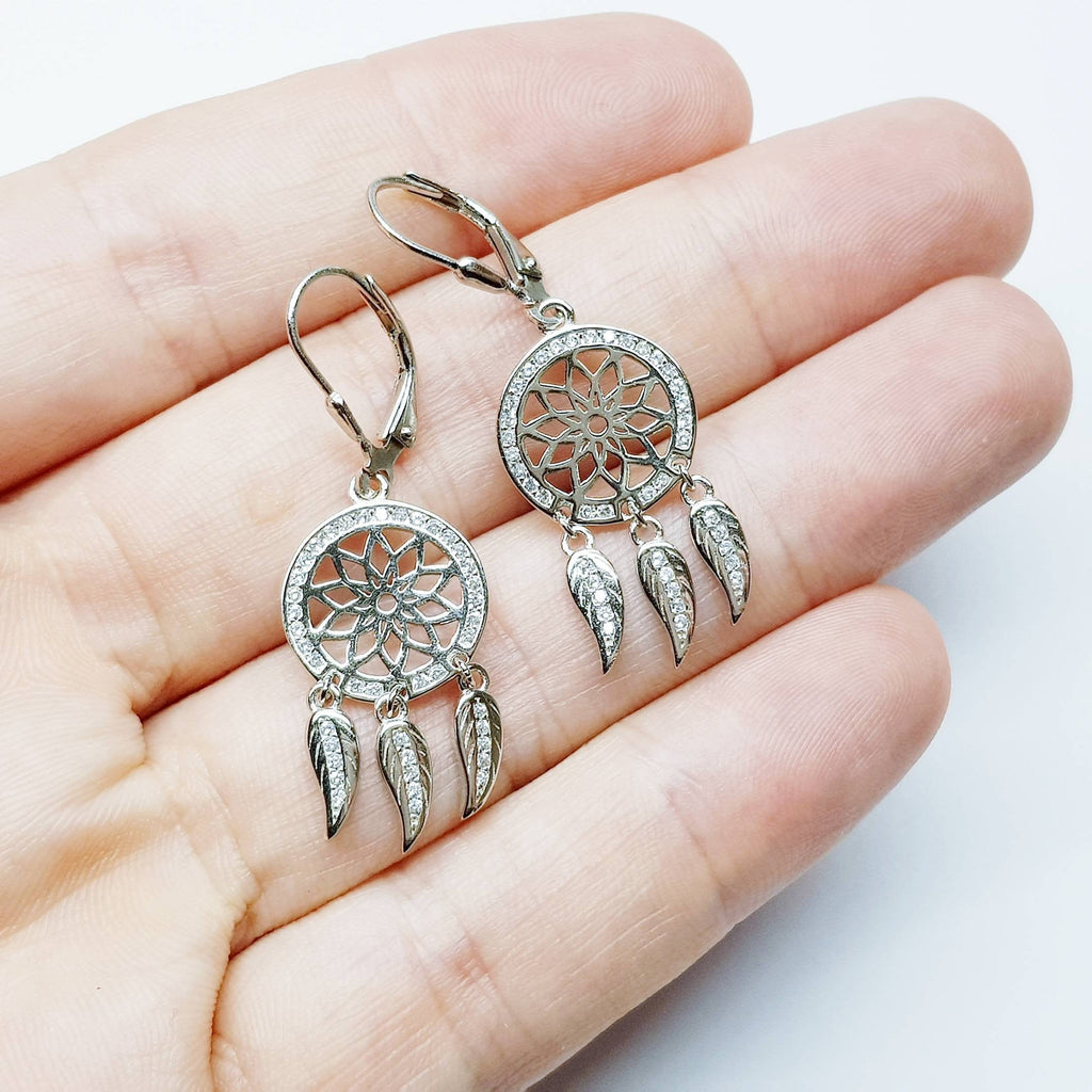 Sterling Silver drop earrings with sun symbol and dangling leaves