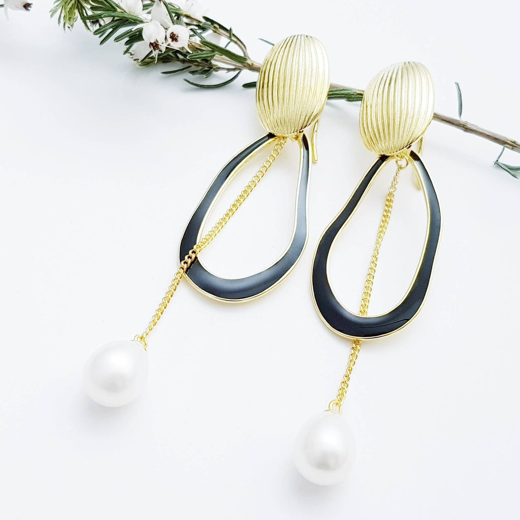 Modern floral inspired dress earrings with black lacquer and freshwater pearls