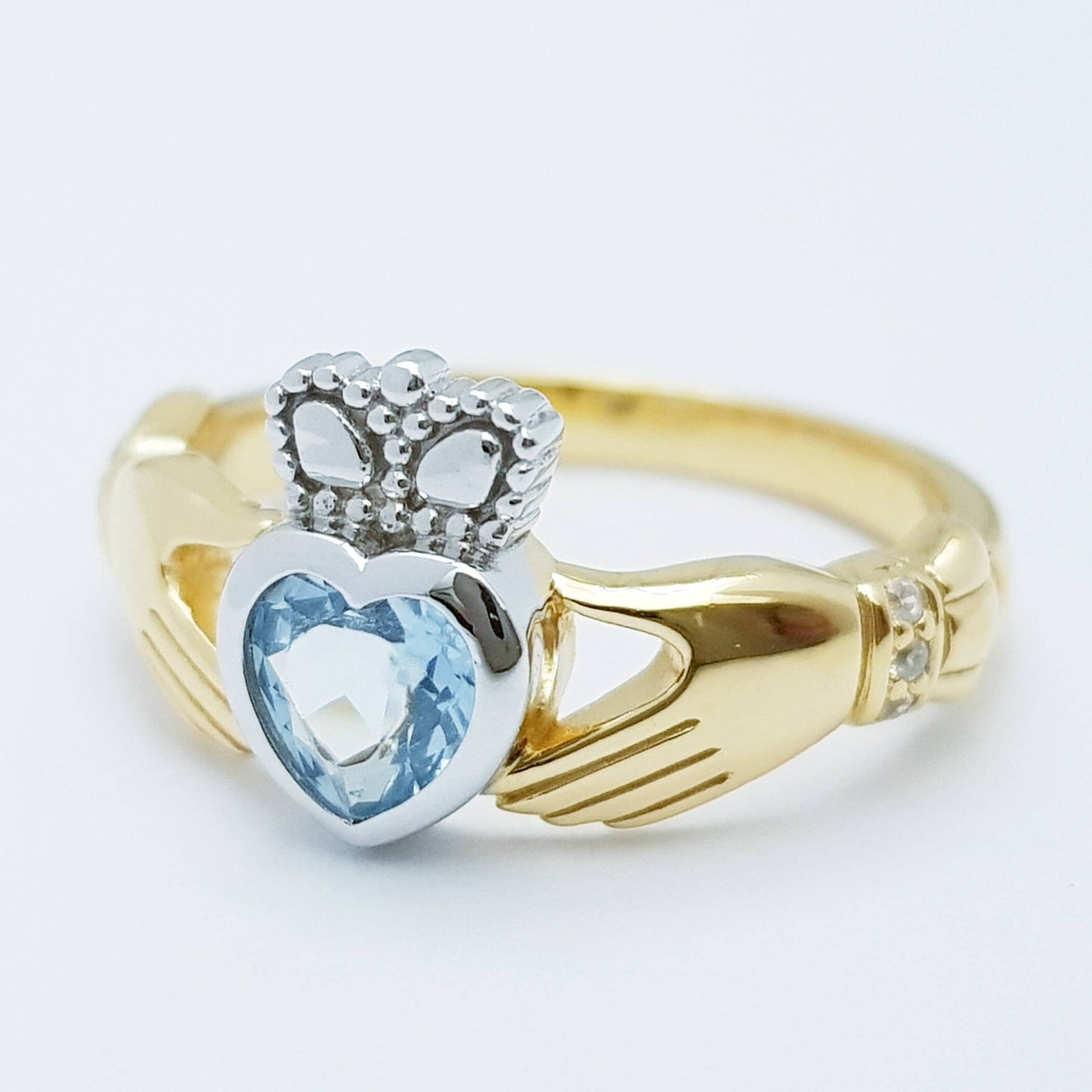Sterling Silver Gold plated Claddagh ring set with light blue aquamarine stone, irish claddagh rings