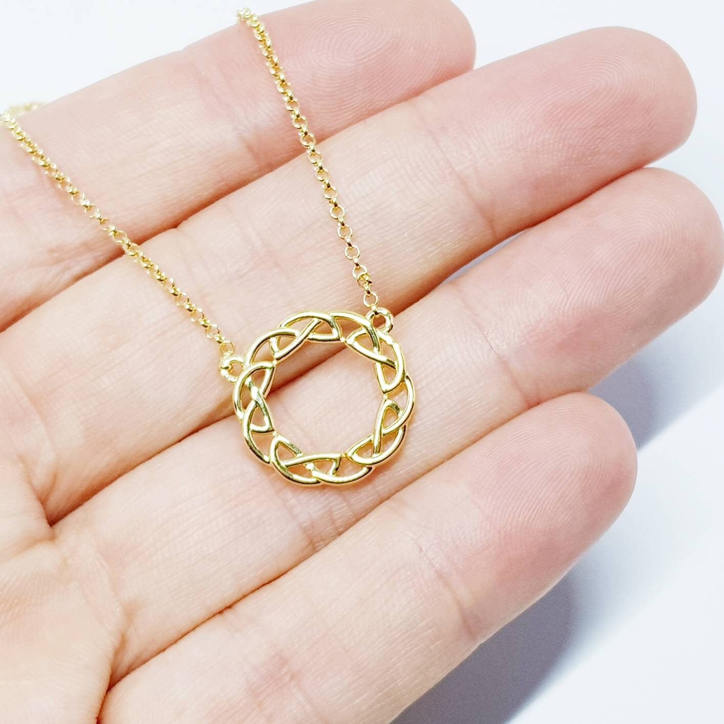 Sterling silver celtic knot pendant, gold round celtic necklace made in Ireland with angel wing chain