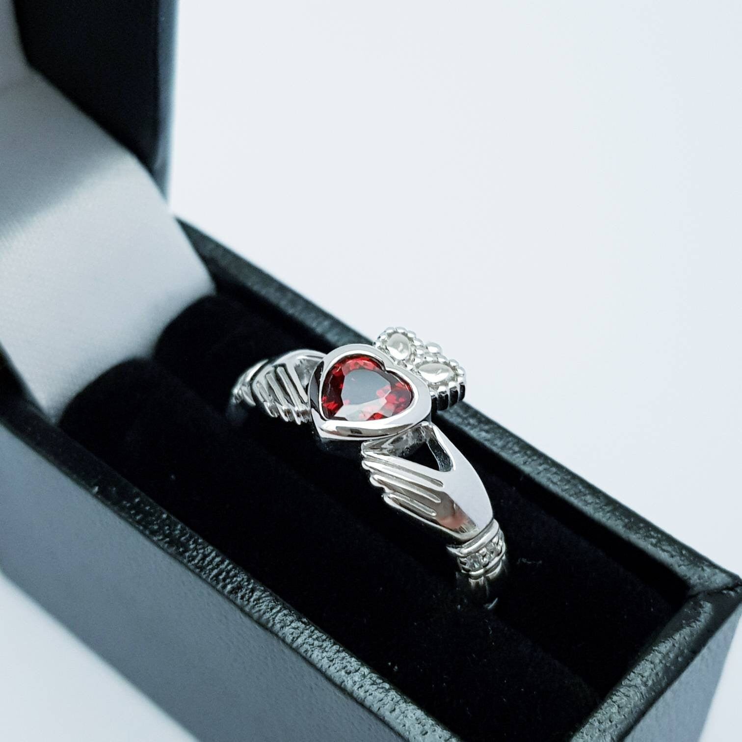 Sterling Silver Claddagh ring set with red garnet heart shaped stone, Irish claddagh rings