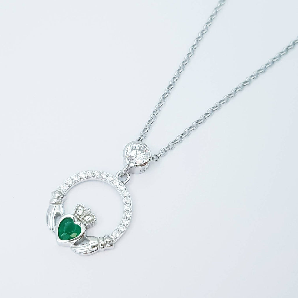 Sterling silver claddagh necklace with emerald green heart shaped stone
