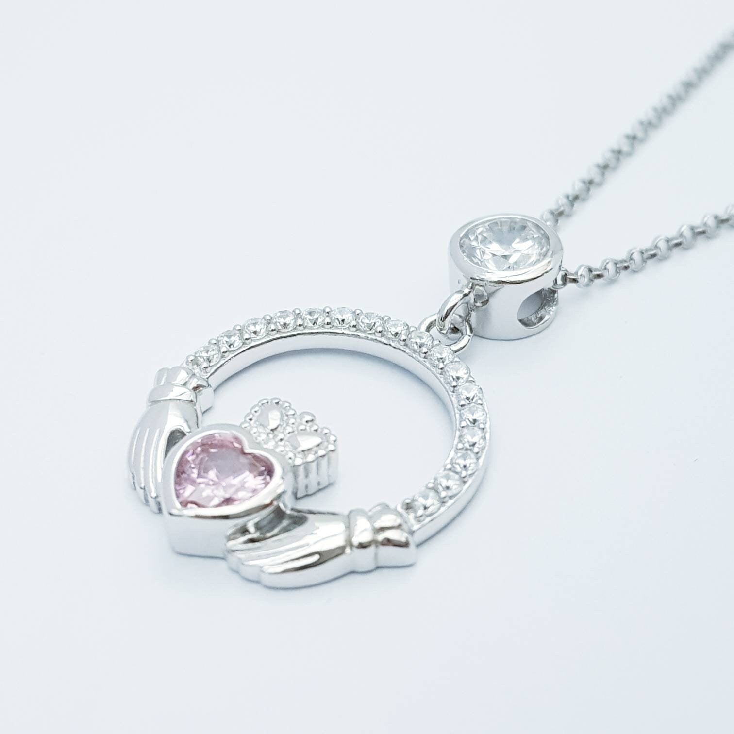 Pink Claddagh pendant, claddagh necklace, silver claddagh pendant with October birthstone