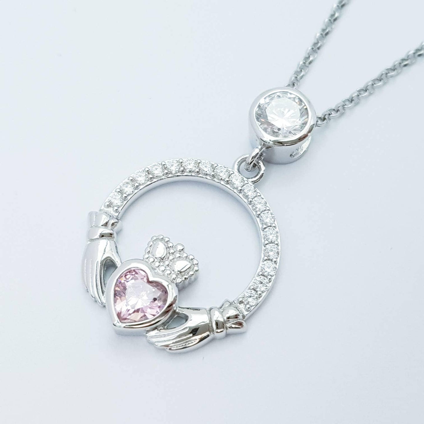 Pink Claddagh pendant, claddagh necklace, silver claddagh pendant with October birthstone