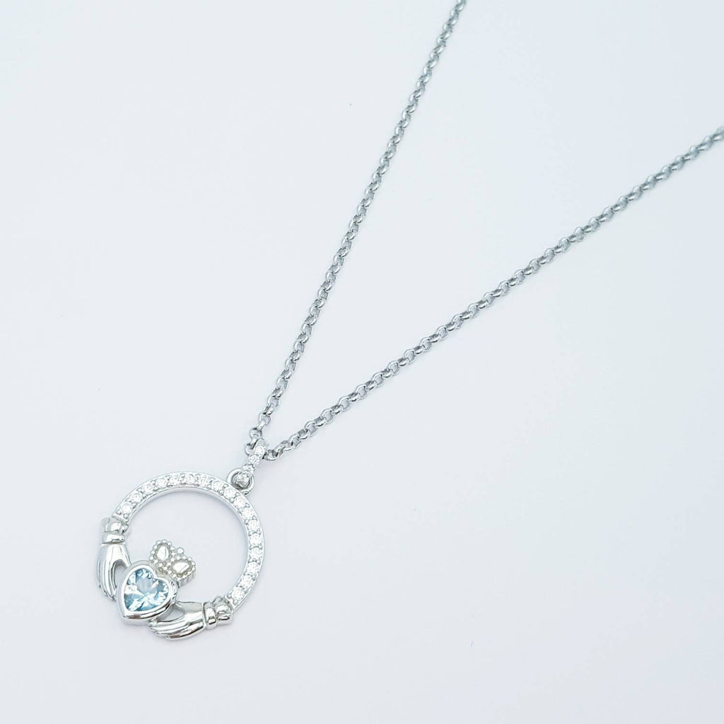 Sterling silver claddagh necklace  with light blue aquamarine heart shaped stone, march birthstone
