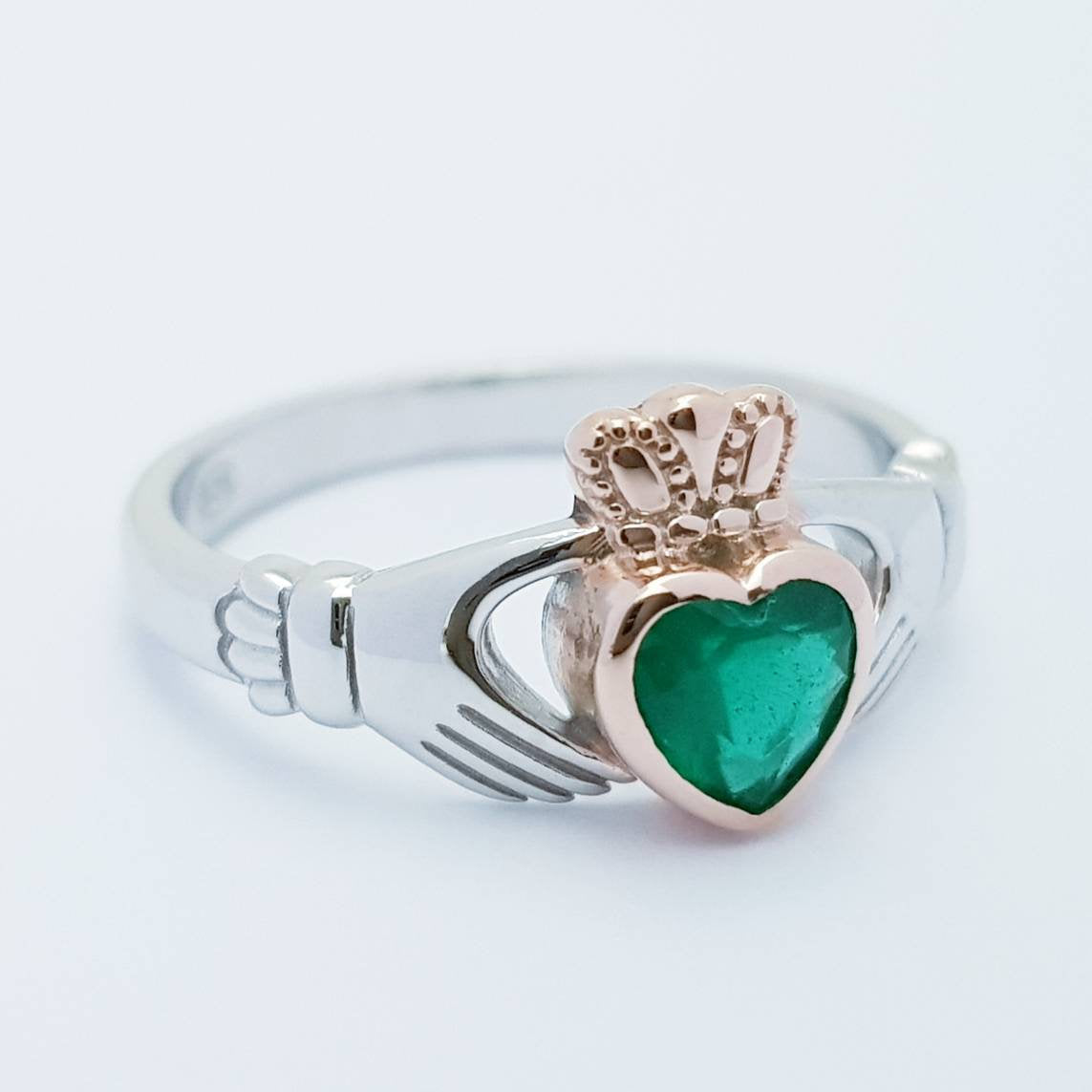 Sterling Silver Rose Gold plated Claddagh ring set with emerald green stone, irish claddagh rings