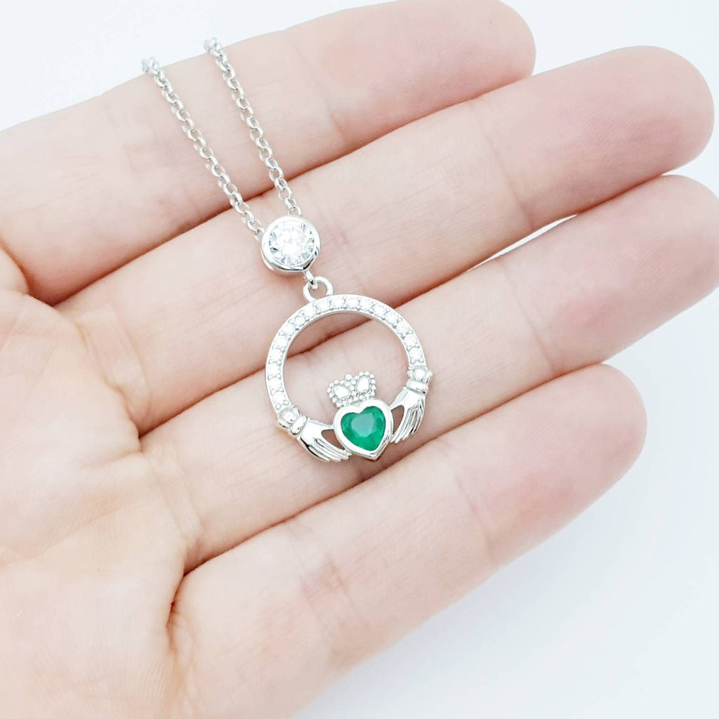 Sterling silver claddagh necklace with emerald green heart shaped stone