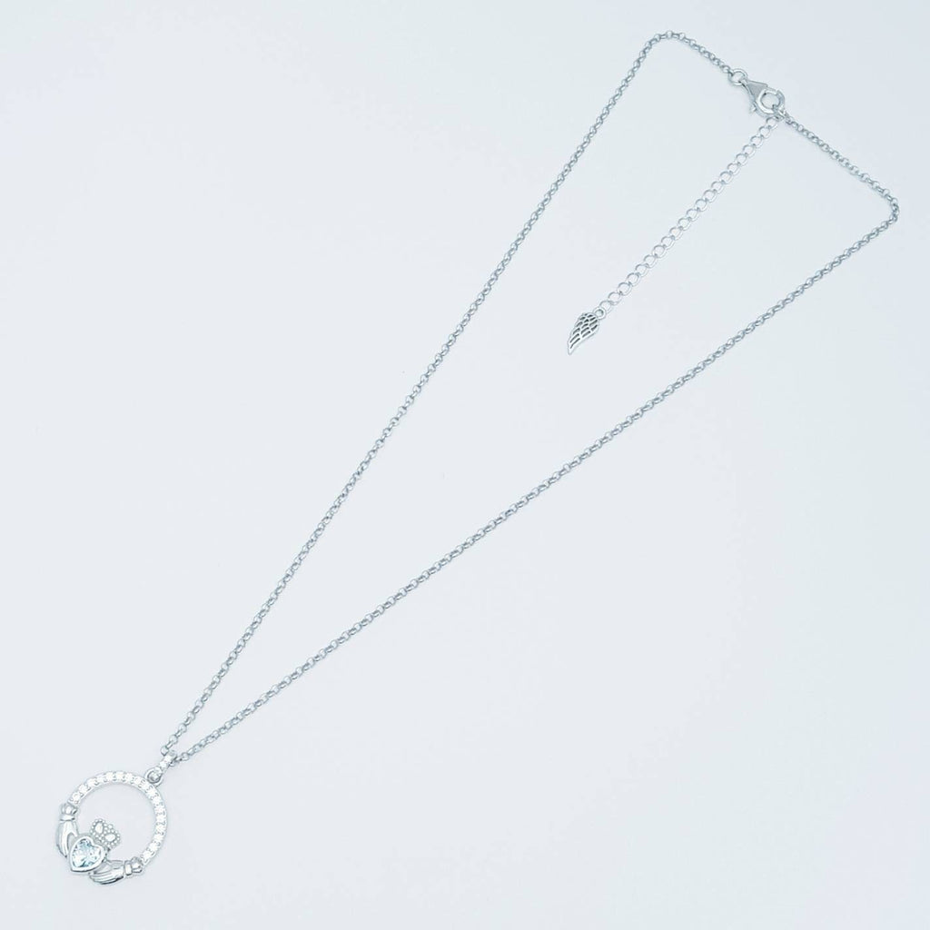 Sterling silver claddagh necklace  with light blue aquamarine heart shaped stone, march birthstone