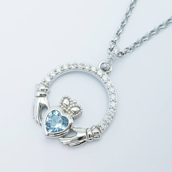 Sterling silver claddagh necklace  with light blue aquamarine heart shaped stone, march birthstone